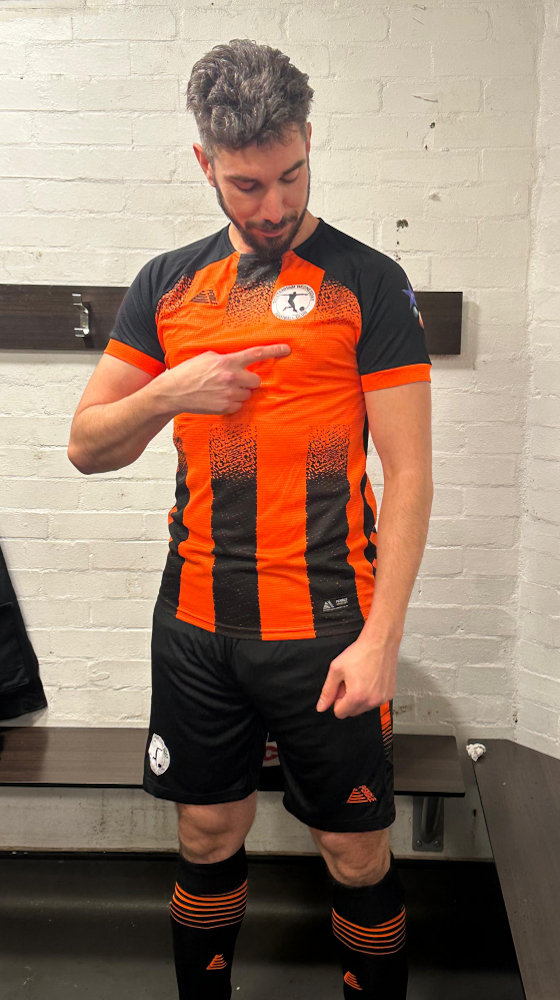 image of a football player in kit